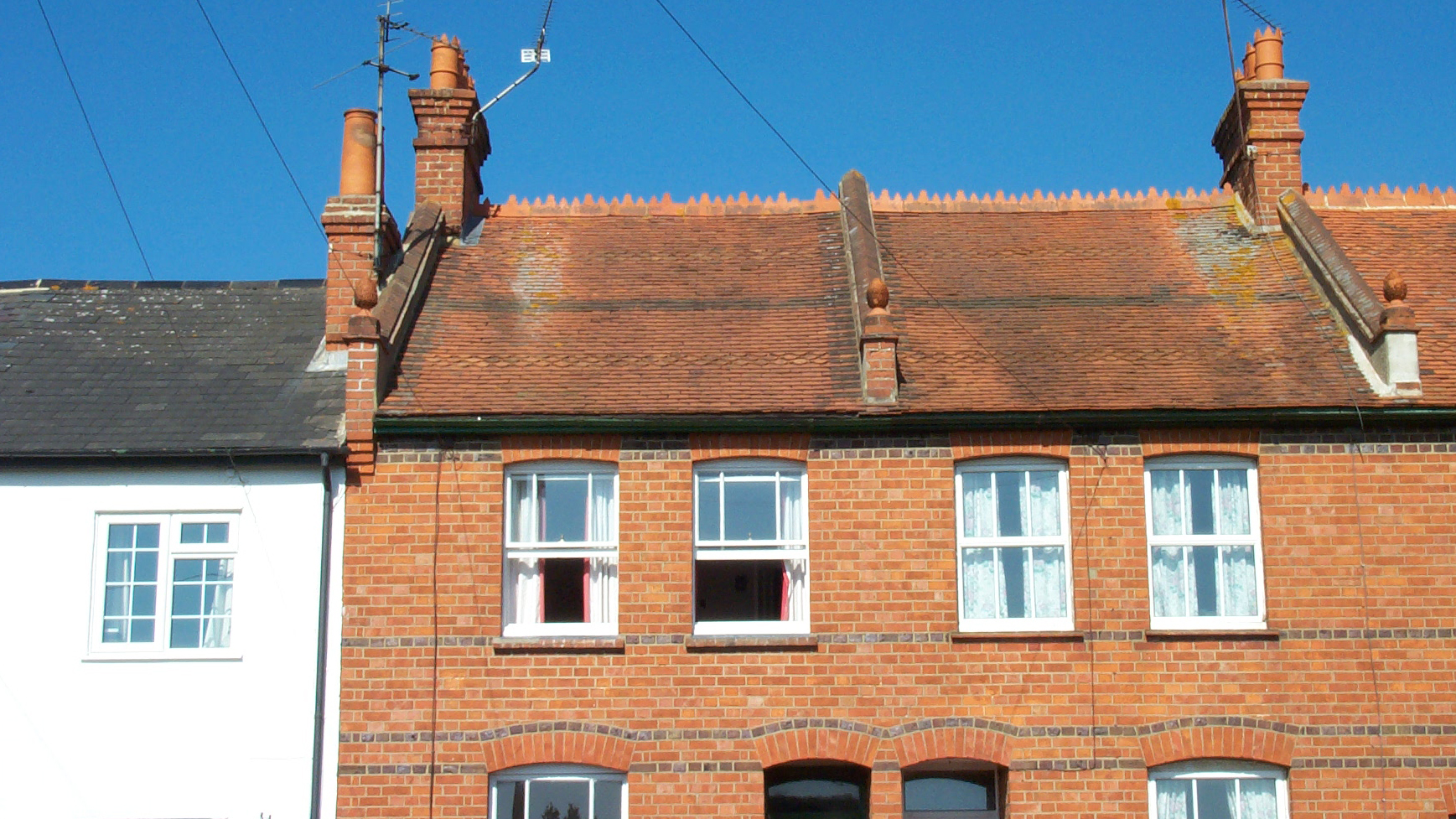 London Victorian houses with traditional roof tiles